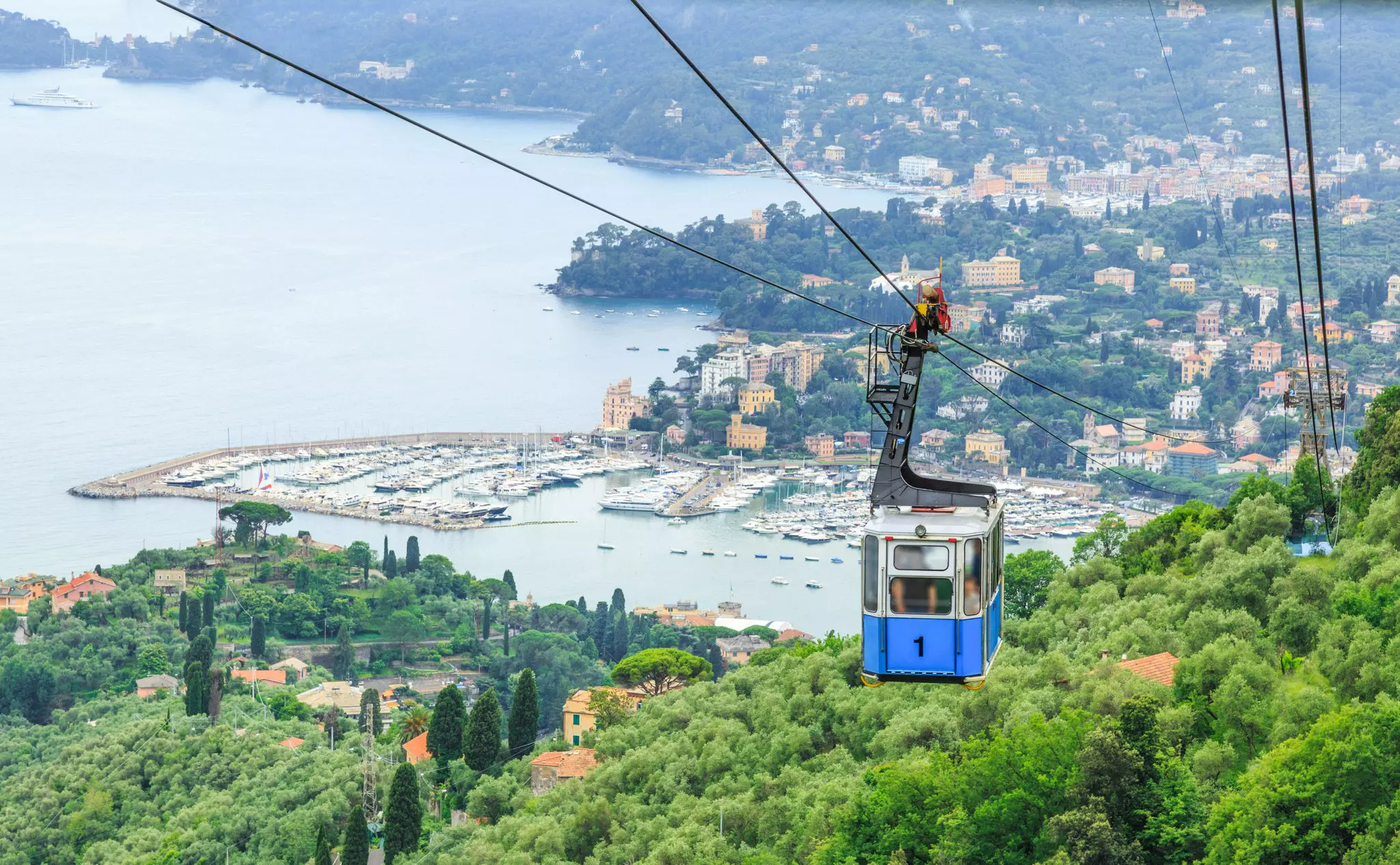 A cable car above the town of Rapallo on the Portofino Peninsula, Liguria, Italy.
