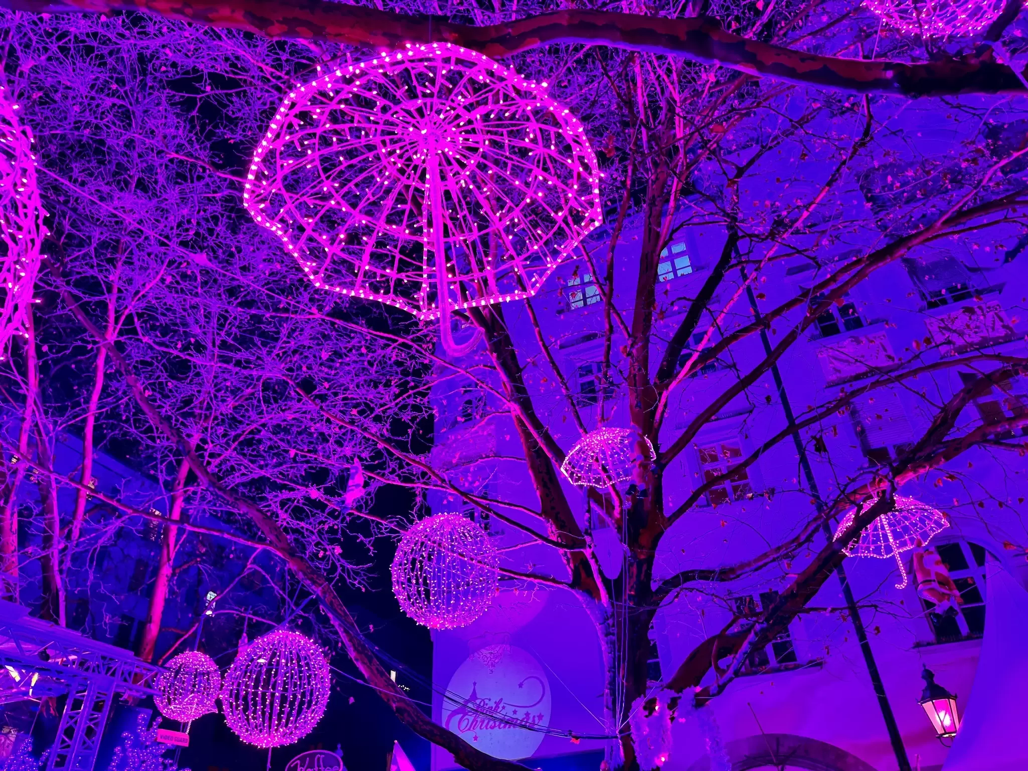 Decorations Inside the Pink Christmas Market (LGBT) at night in Munich, Germany