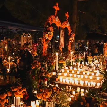 Día de Muertos is celebrated in many different parts of Mexico with stunning offerings to lost loved ones. Eve Orea / Shutterstock