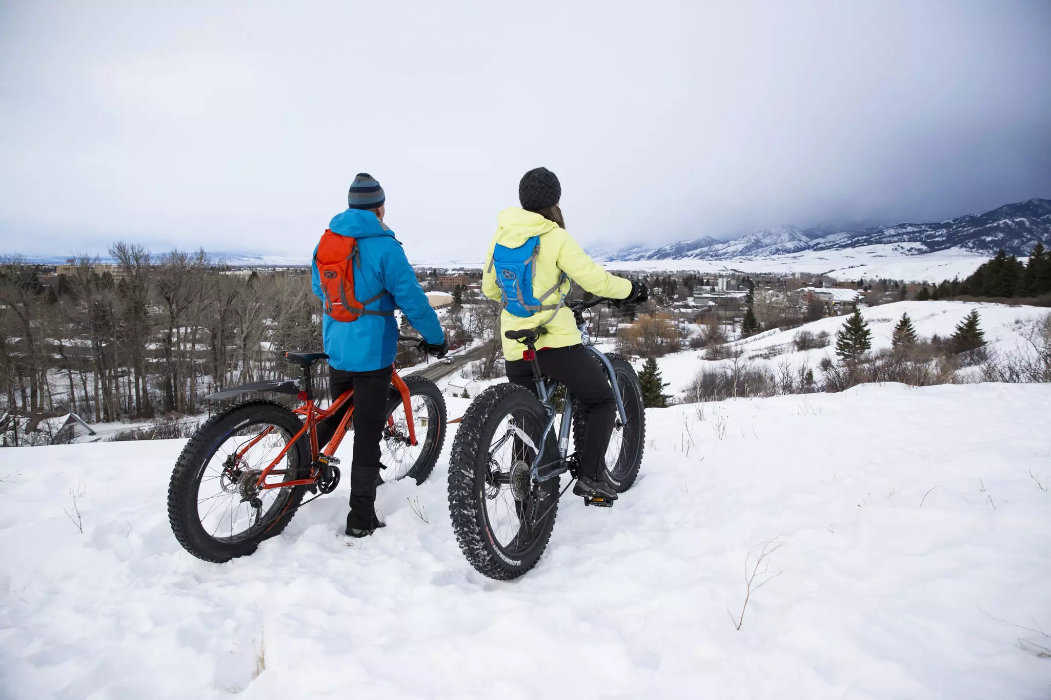 Biking on the snow is a novel way to explore Montana in winter. Jordan Siemens/Getty Images