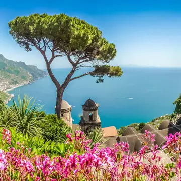 Scenic picture-postcard view of famous Amalfi Coast with Gulf of Salerno from Villa Rufolo gardens in Ravello, Campania,