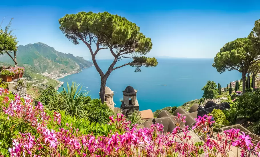 Scenic picture-postcard view of famous Amalfi Coast with Gulf of Salerno from Villa Rufolo gardens in Ravello, Campania,
