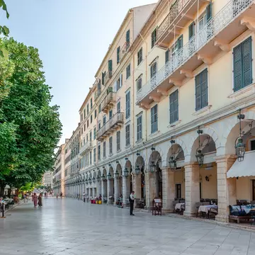 Corfu, Greece - June 3 2022: Liston, a pedestrian street with arcaded terraces and fashionable cafes in the western edge of Spianada Square in the center of the city.; Shutterstock ID 2164255557;