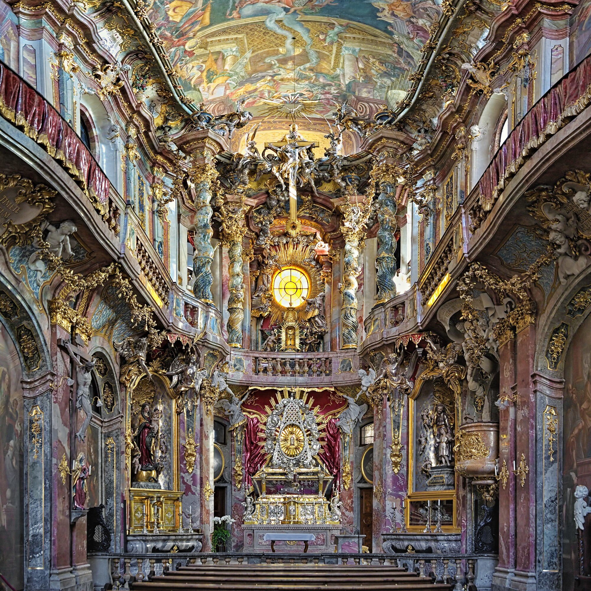 The ornate interior of Asamkirche in Munich, Germany dazzles visitors.