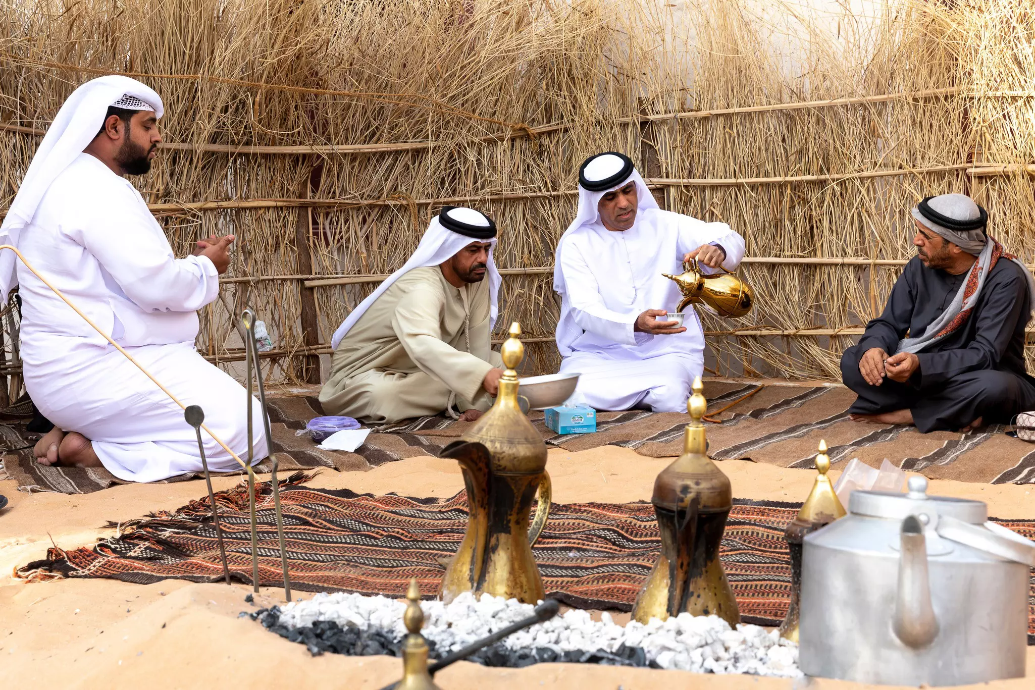 Enjoy a traditional coffee inside a traditional Bedouin tent in Abu Dhabi. Elena Tolmach/Shutterstock