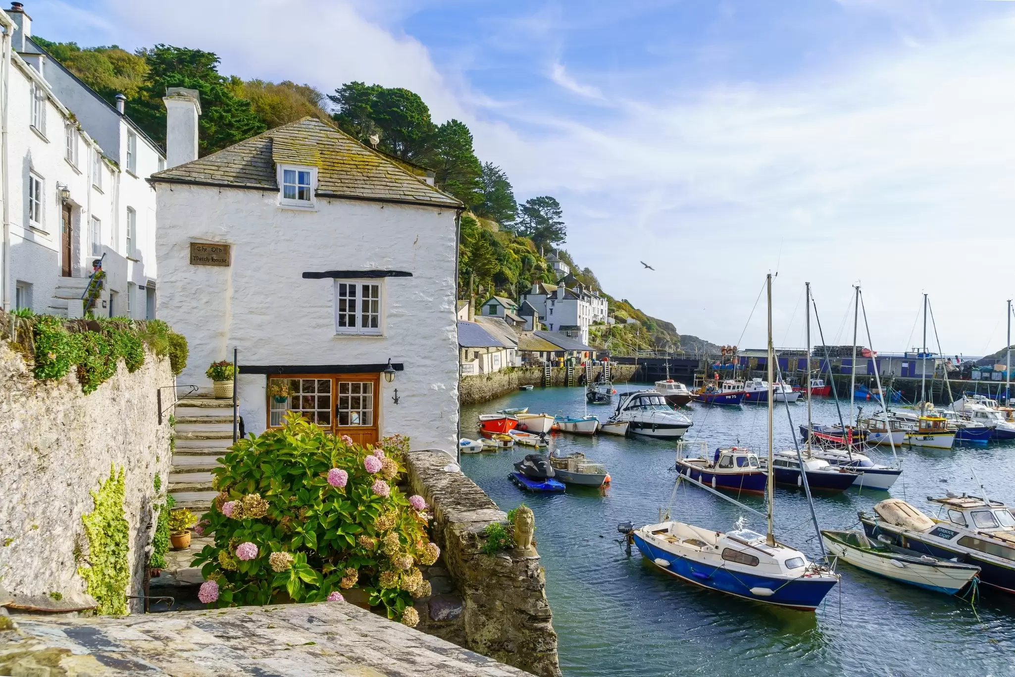 The fishing port of the village Polperro in Cornwall. RnDmS/Shutterstock