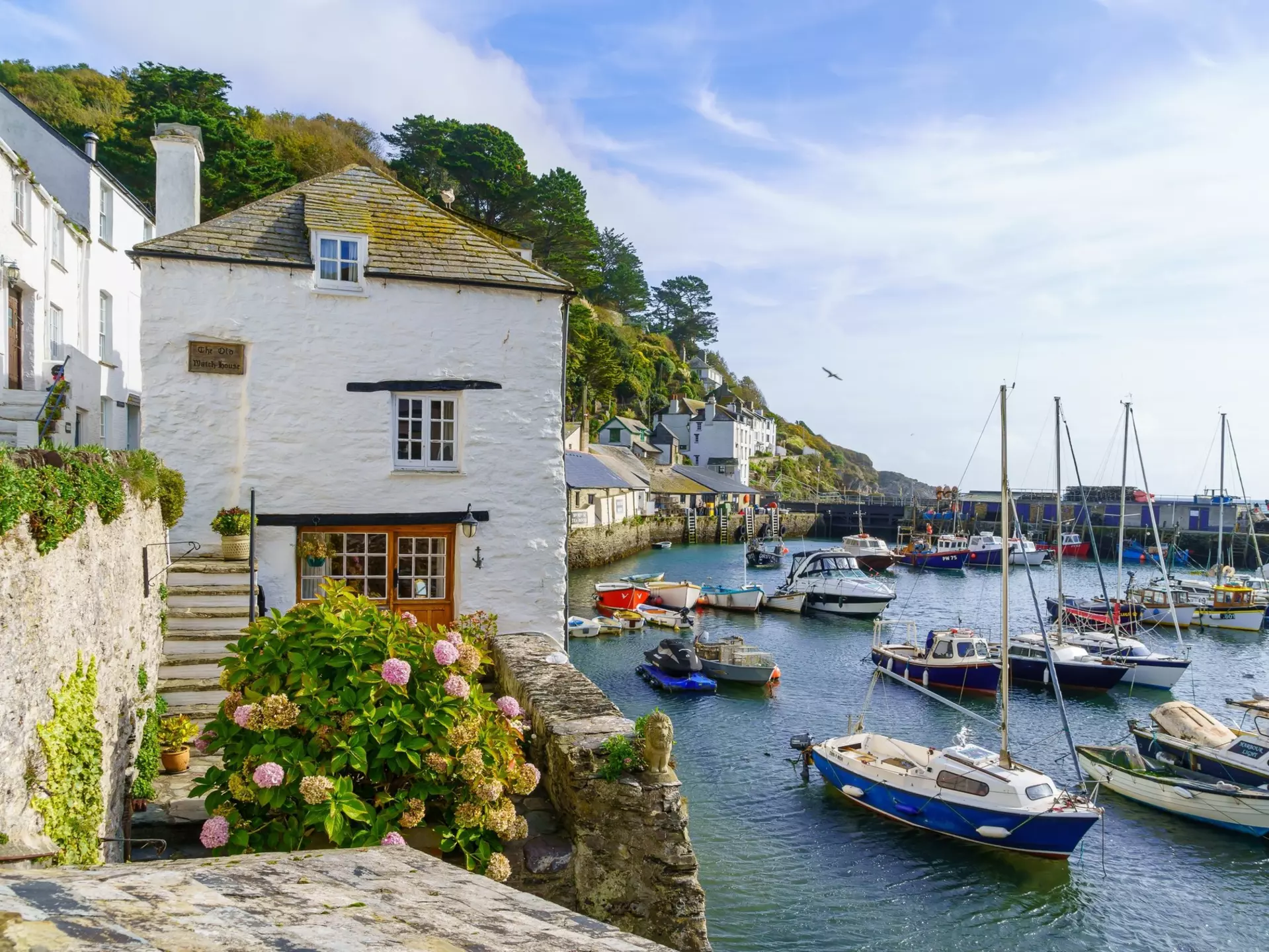 The fishing port of the village Polperro in Cornwall. RnDmS/Shutterstock