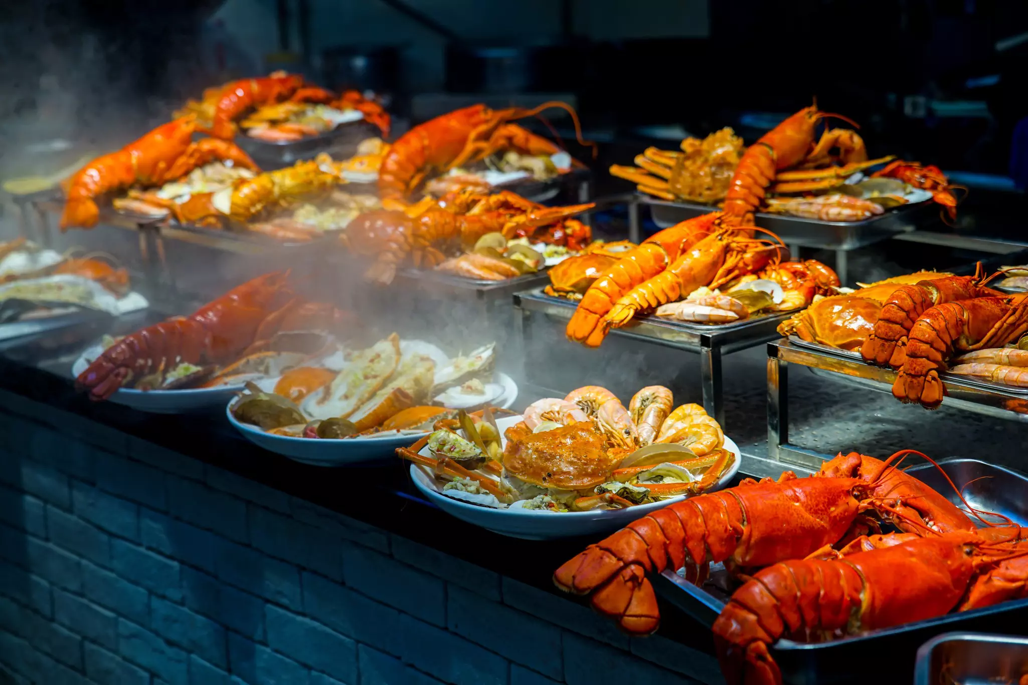 Platters of lobster, prawns and crabs on display in Xiamen, China.