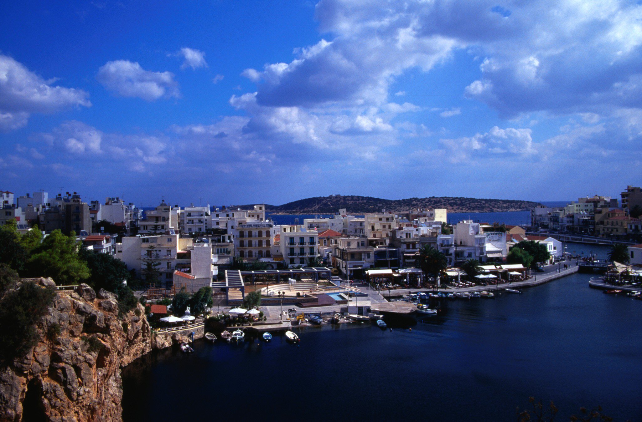 Wharf and buildings surrounding Voulismeni Lake.