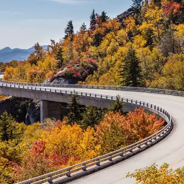 The winding road of Blue Ridge Parkway during fall.