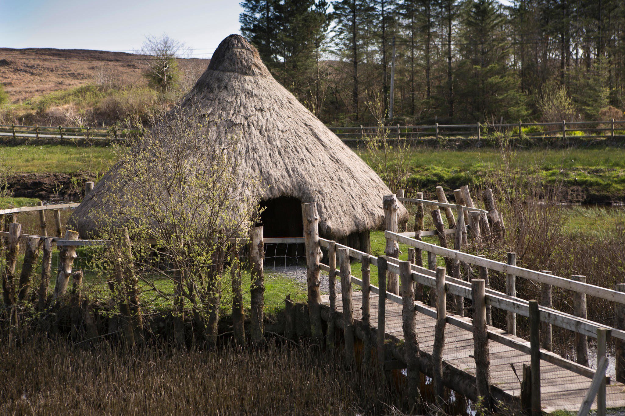 Connemara Heritage & History Centre in Ireland, Co Galway, Connemara. Reconstructed Ring Fort building with greenery surrounding.