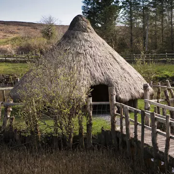 Connemara Heritage & History Centre in Ireland, Co Galway, Connemara. Reconstructed Ring Fort building with greenery surrounding.