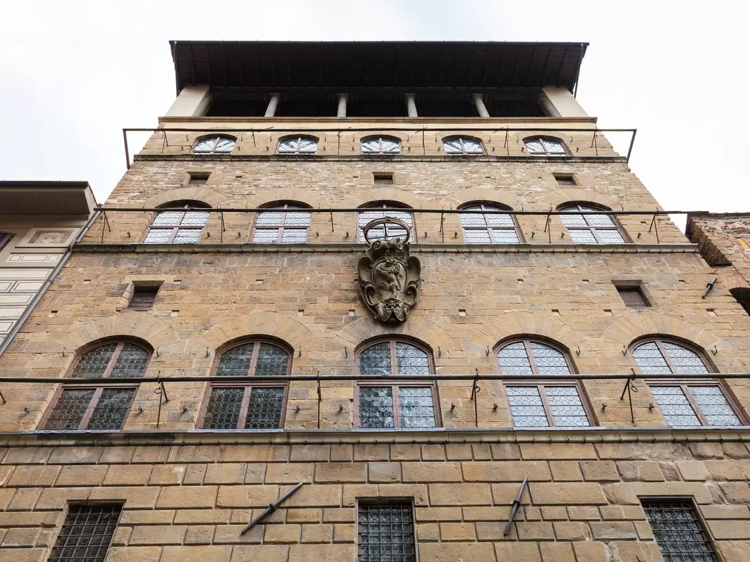 Florence, Italy - November 5, 2016: wall of Palazzo Davanzati, home of Museum of the Old Florentine House (Museo della Casa Fiorentina Antica). The Palace was erected in second half of 14th cent
