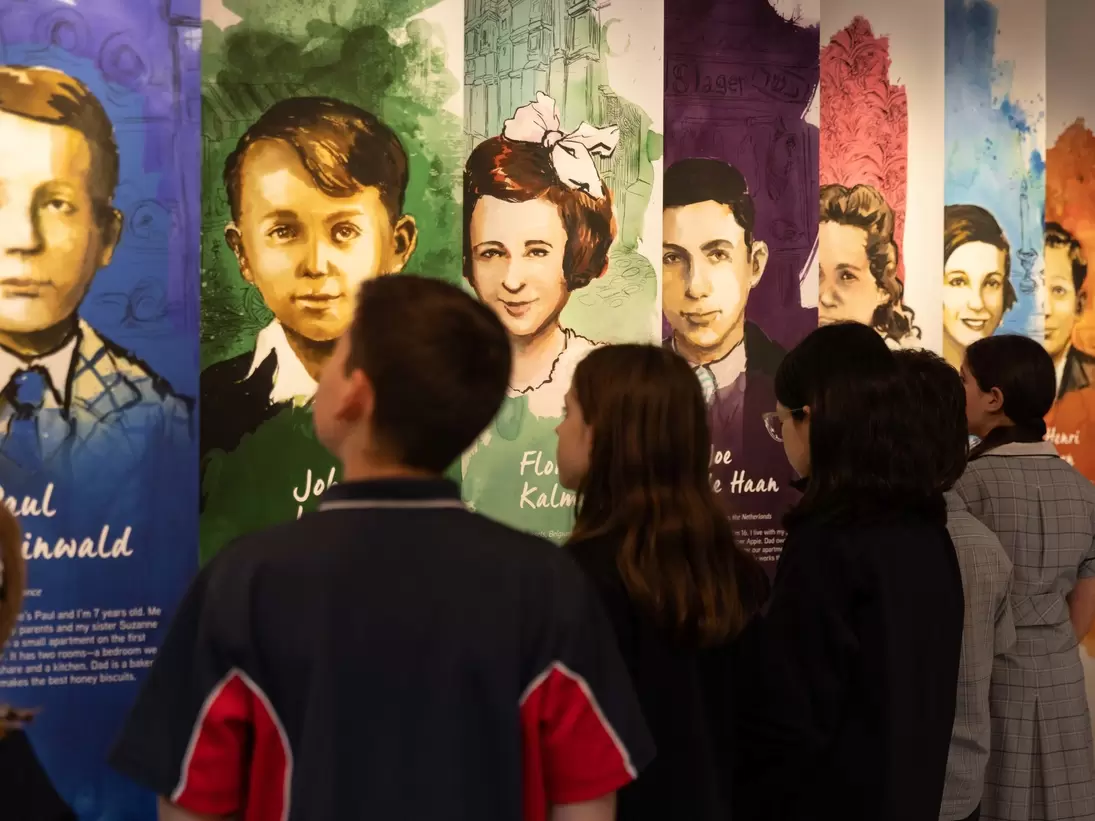 Children looking at a visual exhibition at the Melbourne Holocaust Museum in Melbourne, Australia. 