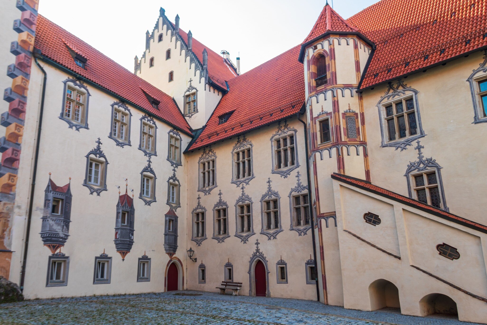 Interior courtyard of Hohes Schloss in Fussen decorated with unique late-Gothic trompe-l'oeil illusionistic paintings.