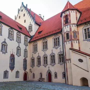 Interior courtyard of Hohes Schloss in Fussen decorated with unique late-Gothic trompe-l'oeil illusionistic paintings.