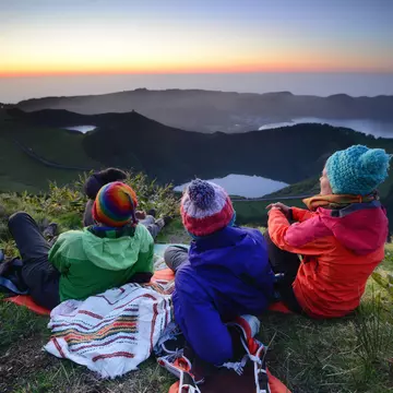 You'll need to hire a car (or organise a taxi for the day) to watch the sunset over Sete Cidades on São Miguel Island © Maya Karkalicheva / Getty Images