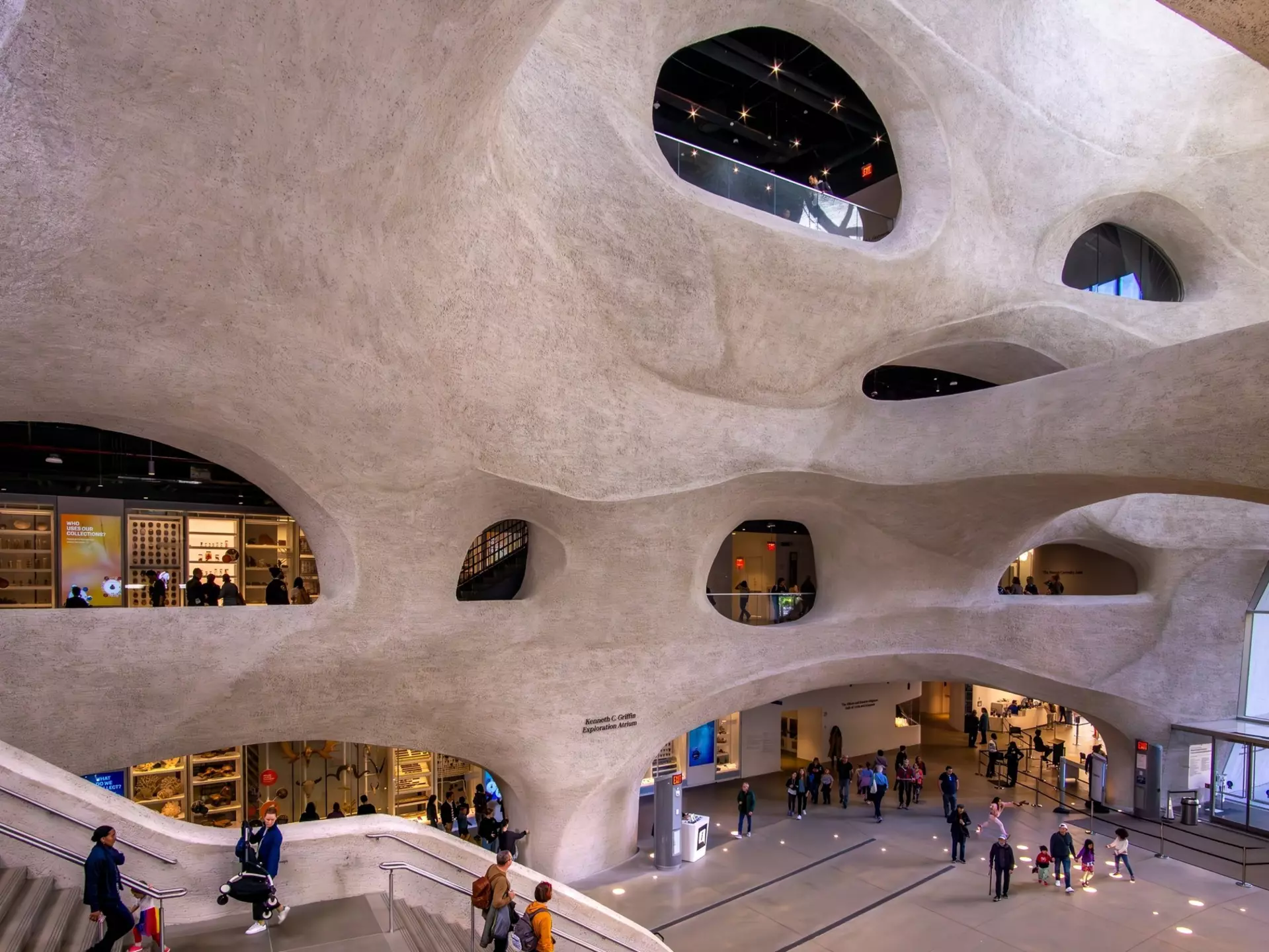 New York, NY - US - Oct 9, 2023 Visitors entering the AMNH’s Richard Gilder Center with its pink Milford granite facade and a textural, curvilinear design inspired by natural topographical elements., License Type: media, Download Time: 2025-01-24T20:03:52.000Z, User: Ppeterson948, Editorial: true, purchase_order: 56530 - Guidebooks, job: Global Publishing WIP, client: Global Publishing WIP, other: Pia Peterson Haggarty