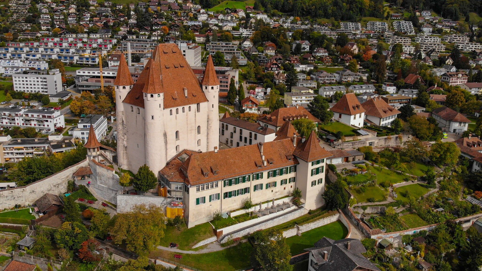 Thun Castle in Switzerland from above - amazing drone footage; Shutterstock ID 1835016817;