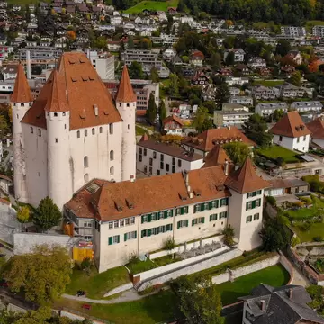 Thun Castle in Switzerland from above - amazing drone footage; Shutterstock ID 1835016817;