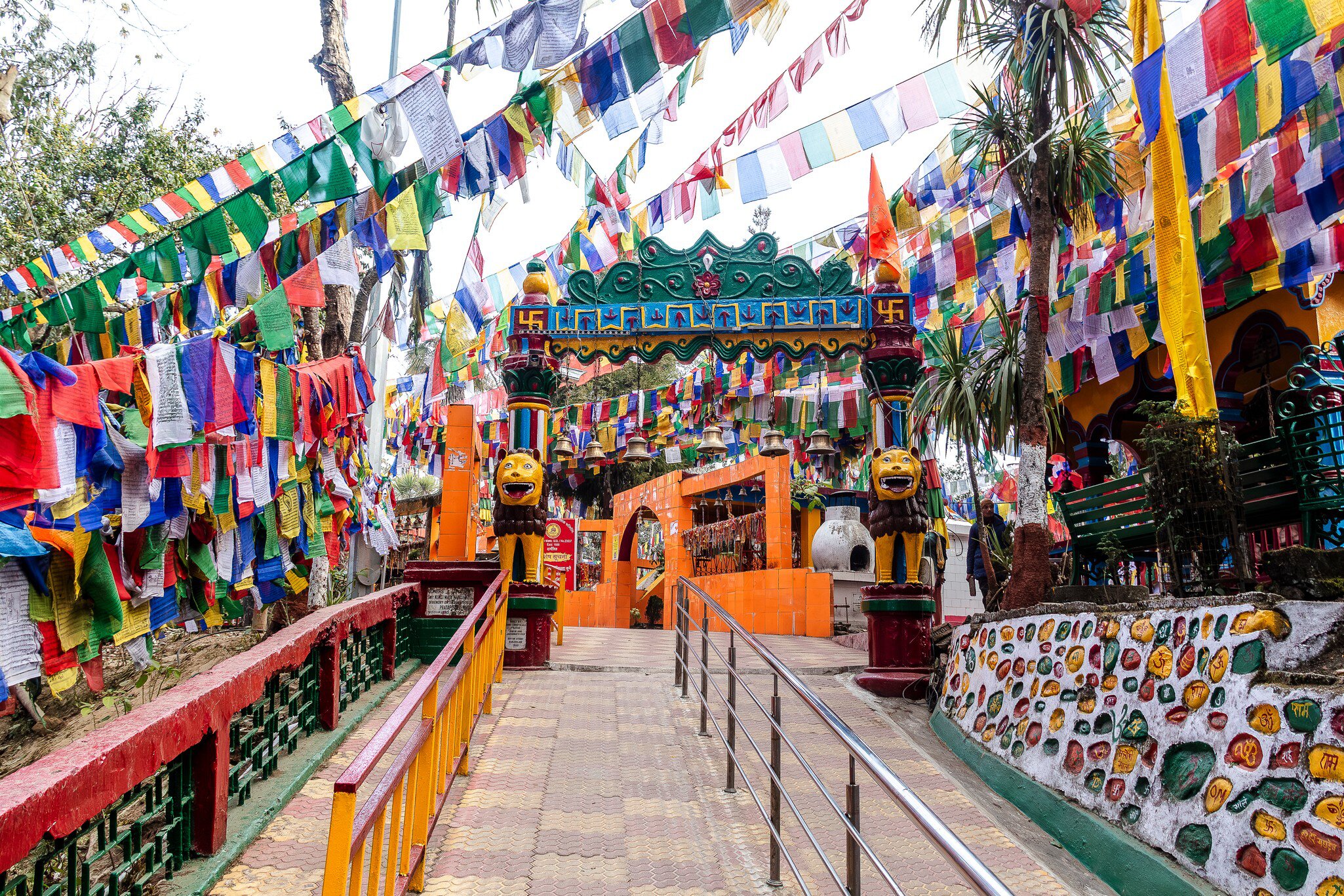 Main entranceway strewn with prayer flags at Observatory Hill in Darjeeling, West Bengal, India. 