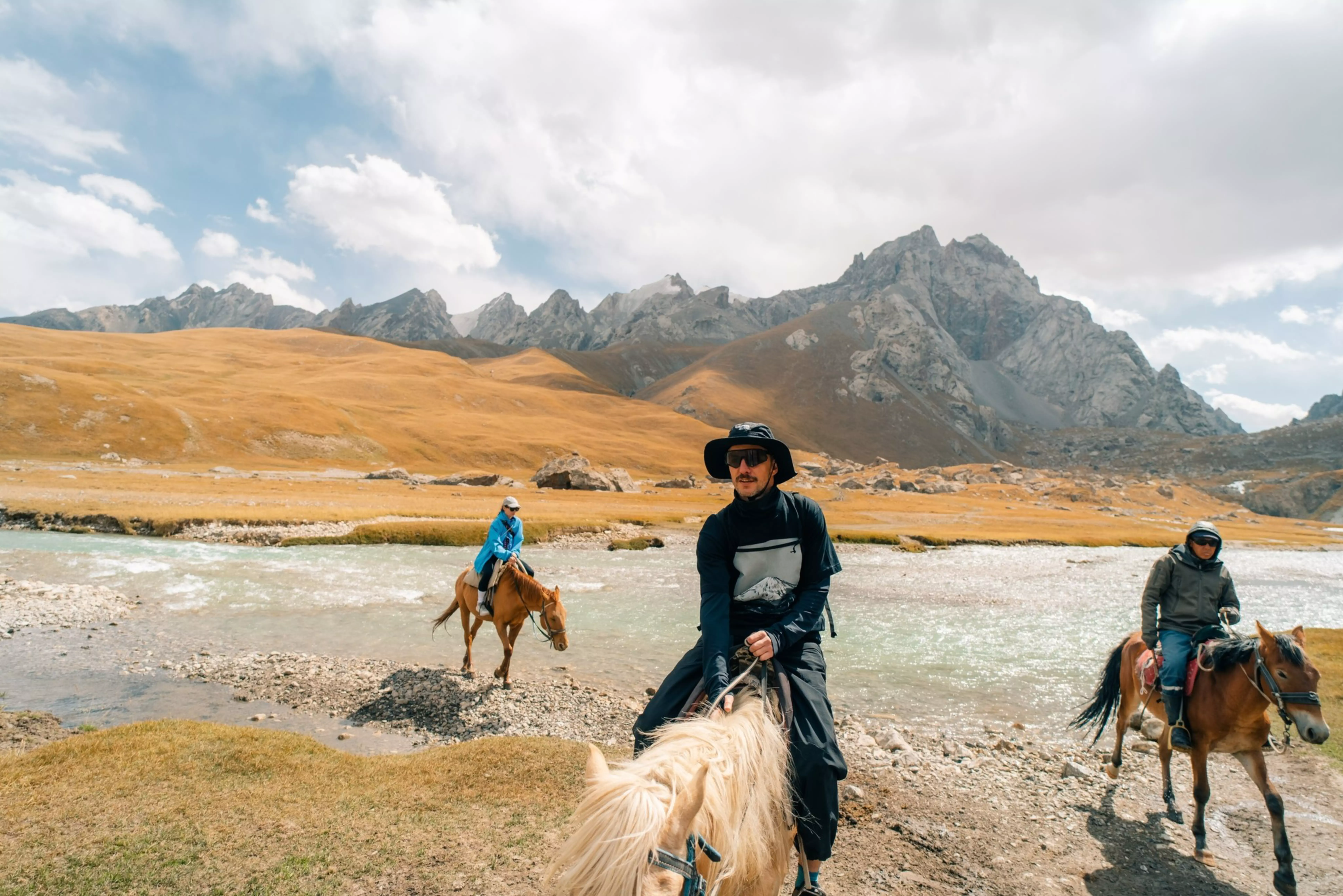 Horseback riding in Kurumduk valley Naryn province, Kyrgyzstan (Brester Irina / Shutterstock)