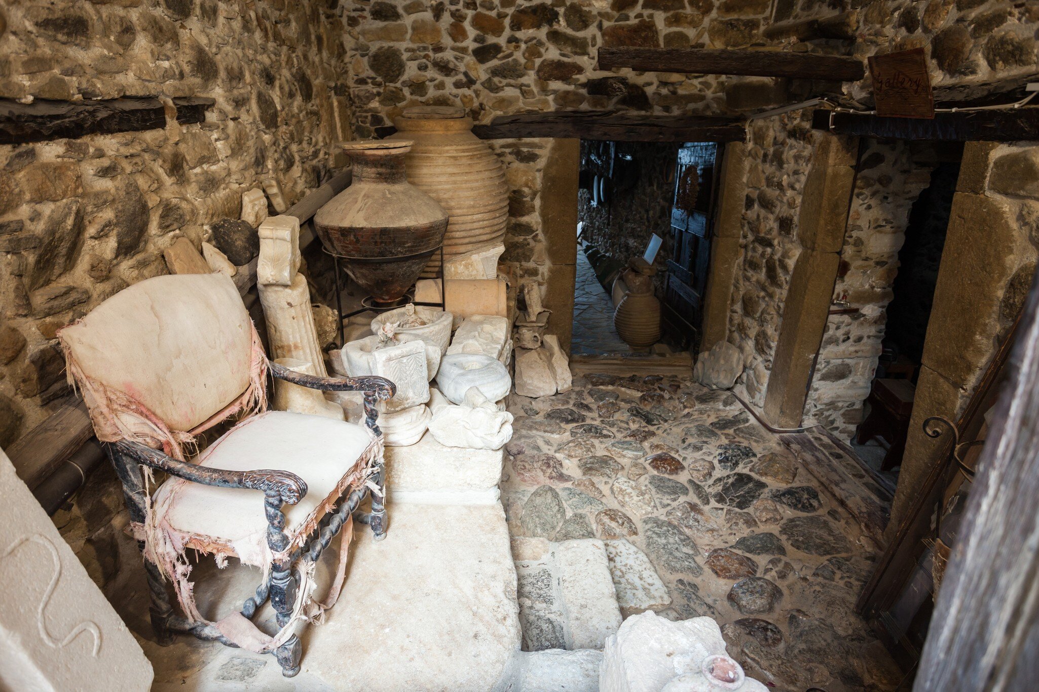 NAXOS ISLAND, GREECE - OCTOBER 24, 2016: Venetian Museum, Tower Della Rocca Barozzi, located at the entrance of the Castle of Chora, Naxos.; Shutterstock ID 572777338;
