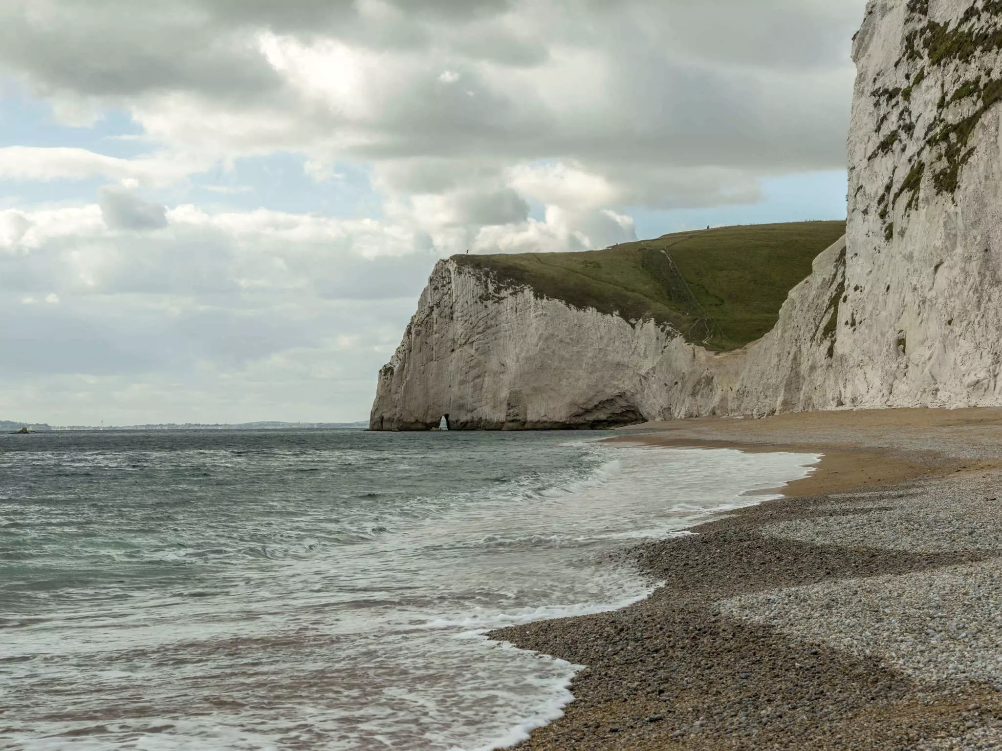 Jurassic shoreline on a fine summer day featuring Bat's Head.