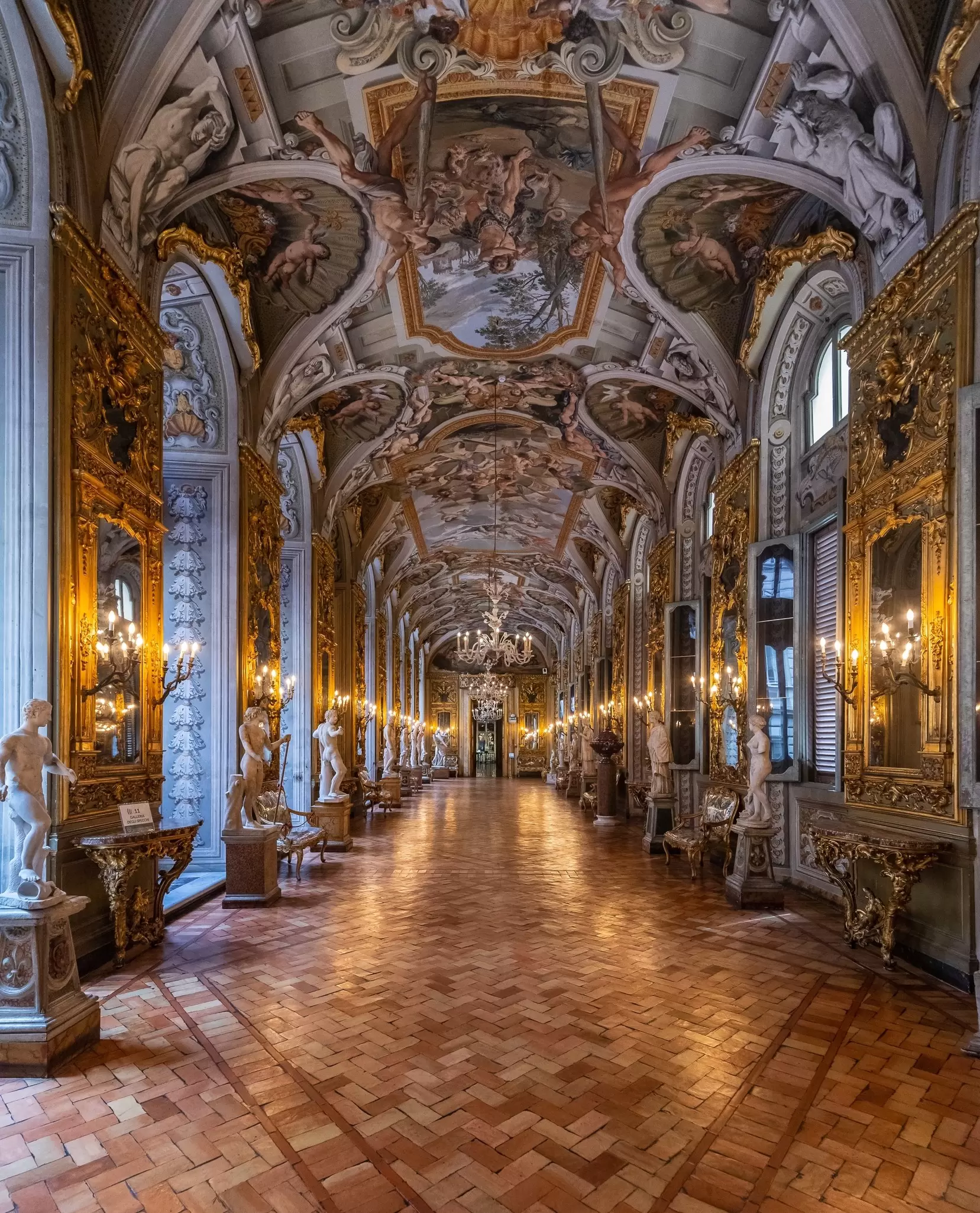 Interior of the Galleria degli Specchi (or Hall of Mirrors) at the Galleria Doria Pamphilj in Rome, Italy.