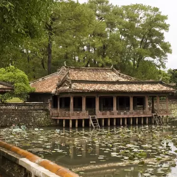 Raining on pond and lotus flower. Tu Duc Tomb, Hue. Pavilion of  imperial tomb Nguyen dynasty - Vietnam; Shutterstock ID 28059859; Your name (First / Last): Josh Vogel; Project no. or GL code: 56530; Network activity no. or Cost Centre: Online-Des...