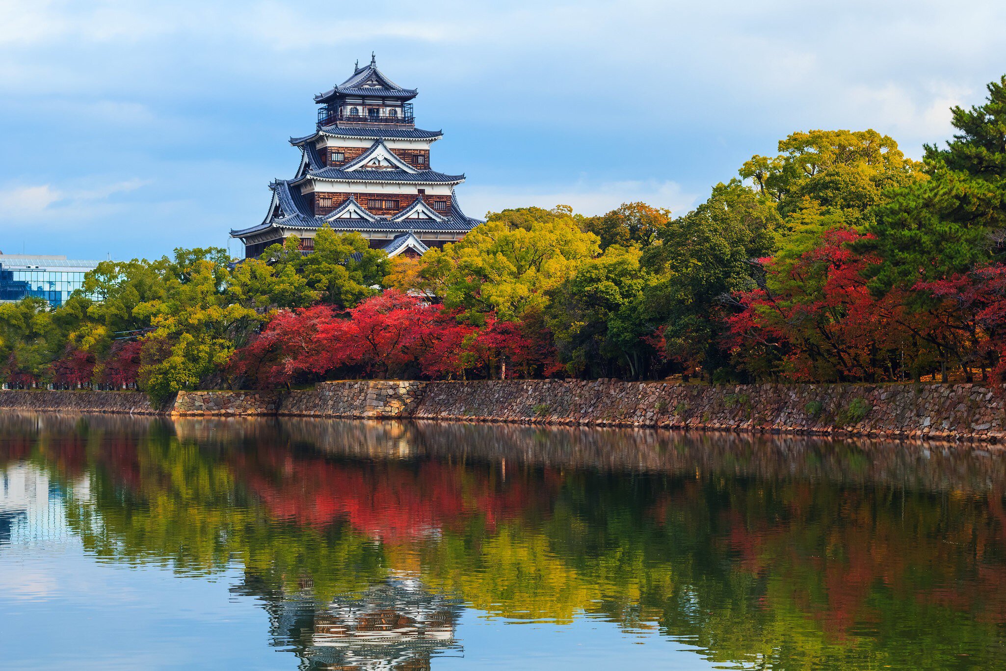 Hiroshima castle on the side of Otagawa river in autumn .
ancient, architecture, asia, asian, attraction, autumn, building, castle, culture, defence, east, emperor, fall, fort, fortification, hiroshima, hiroshimajo, history, honshu, japan, japanese, kansai, landmark, landscape, old, oriental, otagawa, park, river, samurai, sightseeing, stone, tourism, tourist, tower, traditional, travel