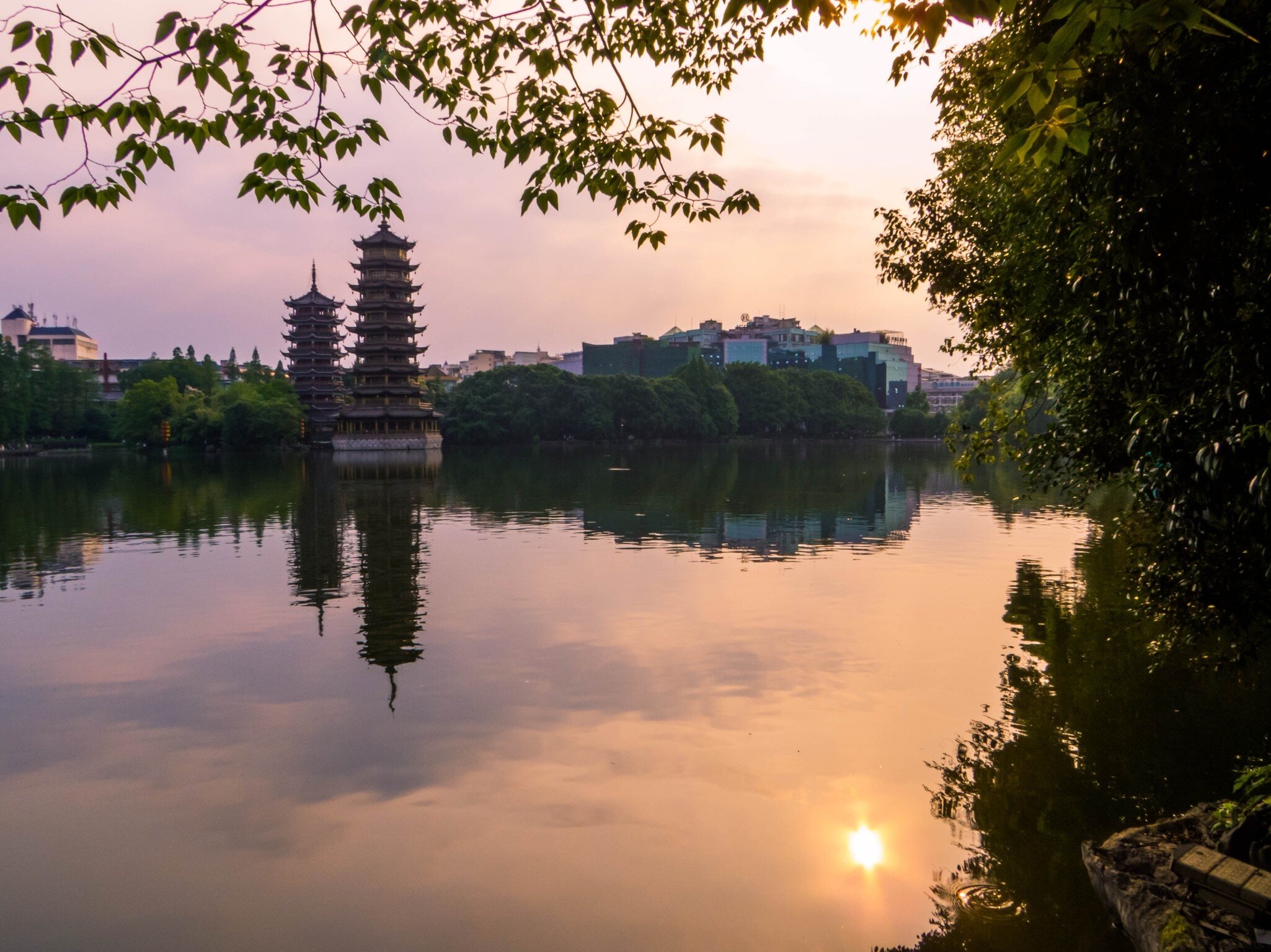 View of The Sun and Moon Pagodas on the Shan Lake. In Guilin, China, License Type: media, Download Time: 2026-09-02T15:50:23.000Z, User: LP_NZhan, Editorial: false, purchase_order: 65050 - Digital Destinations and Articles, job: App Content, client: Lonely Planet App, other: Nadine Zhan