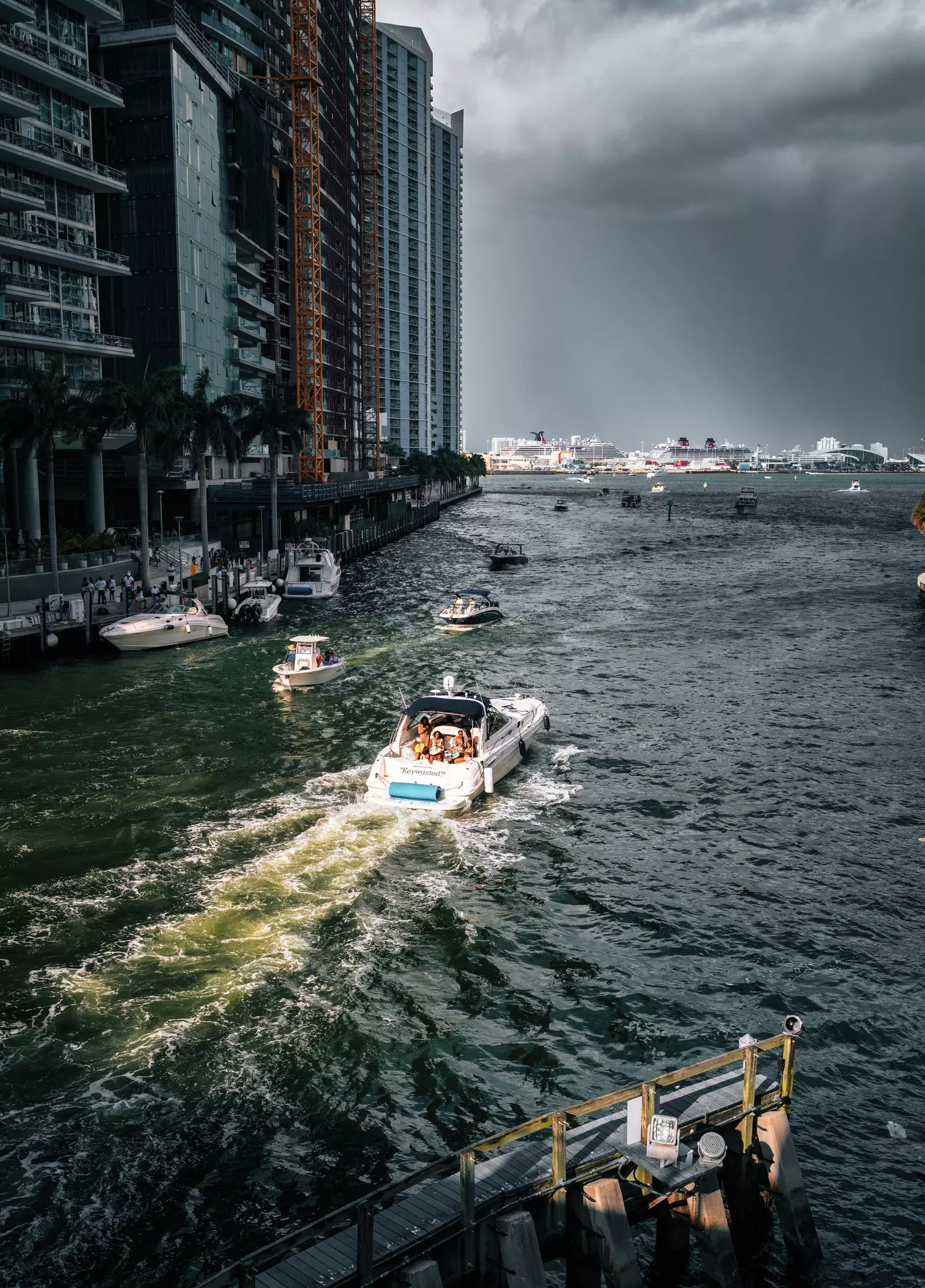 Boats on the river sea Miami Florida with gray skies beyond 
