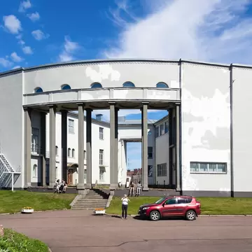 Hermitage-Vyborg - branch of State Hermitage, exhibition center, sunny summer day, people walking - Vyborg, Russia, August 2022; Shutterstock ID 2188134475;