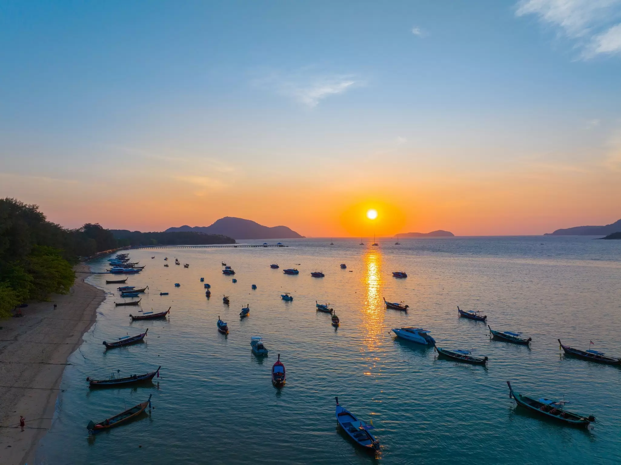 Head to quieter fishing villages like Rawai Beach for a slower paced experience of Phuket. Mongkol chai/Shutterstock