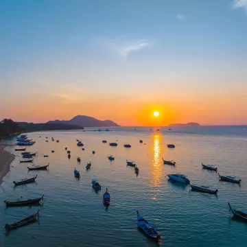 Head to quieter fishing villages like Rawai Beach for a slower paced experience of Phuket. Mongkol chai/Shutterstock