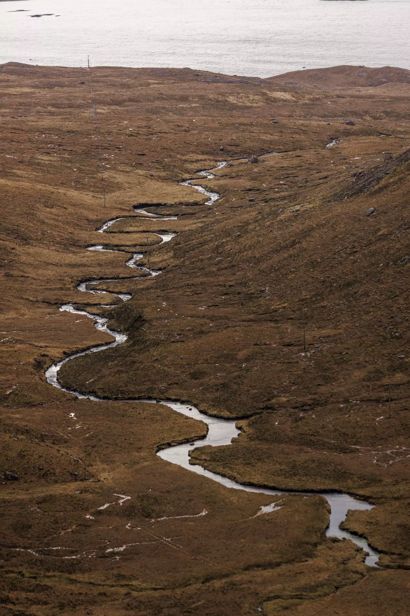 A winding river in the Scottish Highlands.
