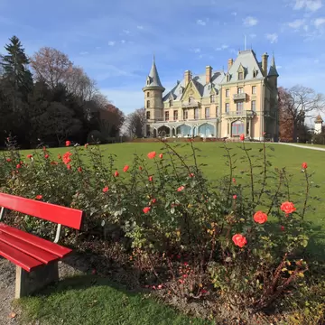 beautiful castle and garden on the shore of Lake Thun, Switzerland ; Shutterstock ID 556784830;