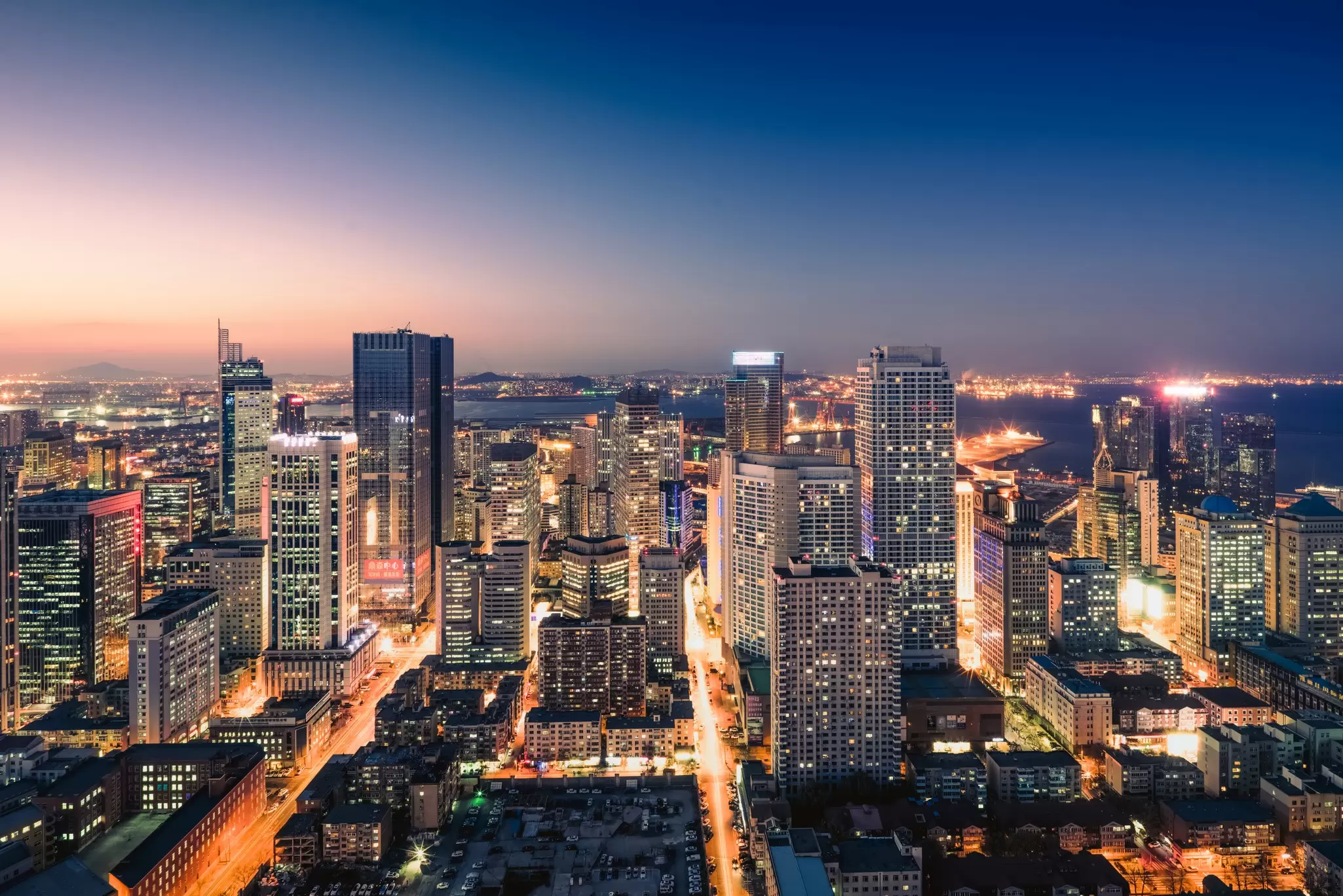 Shenyang cityscape at night. shunli zhao / Getty Images