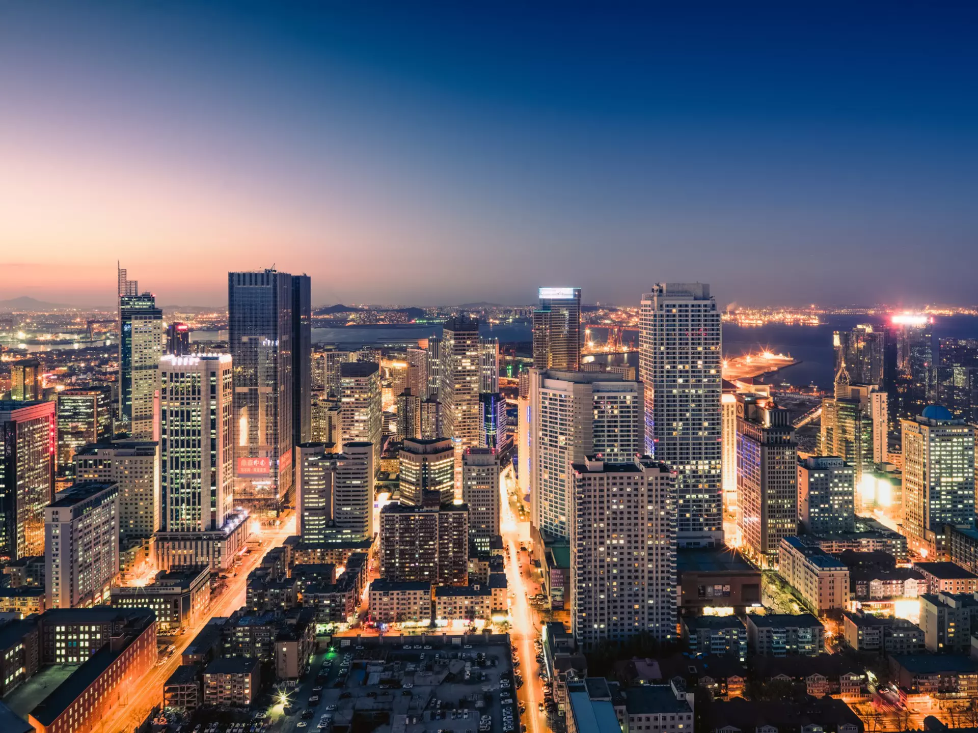 Shenyang cityscape at night. shunli zhao / Getty Images