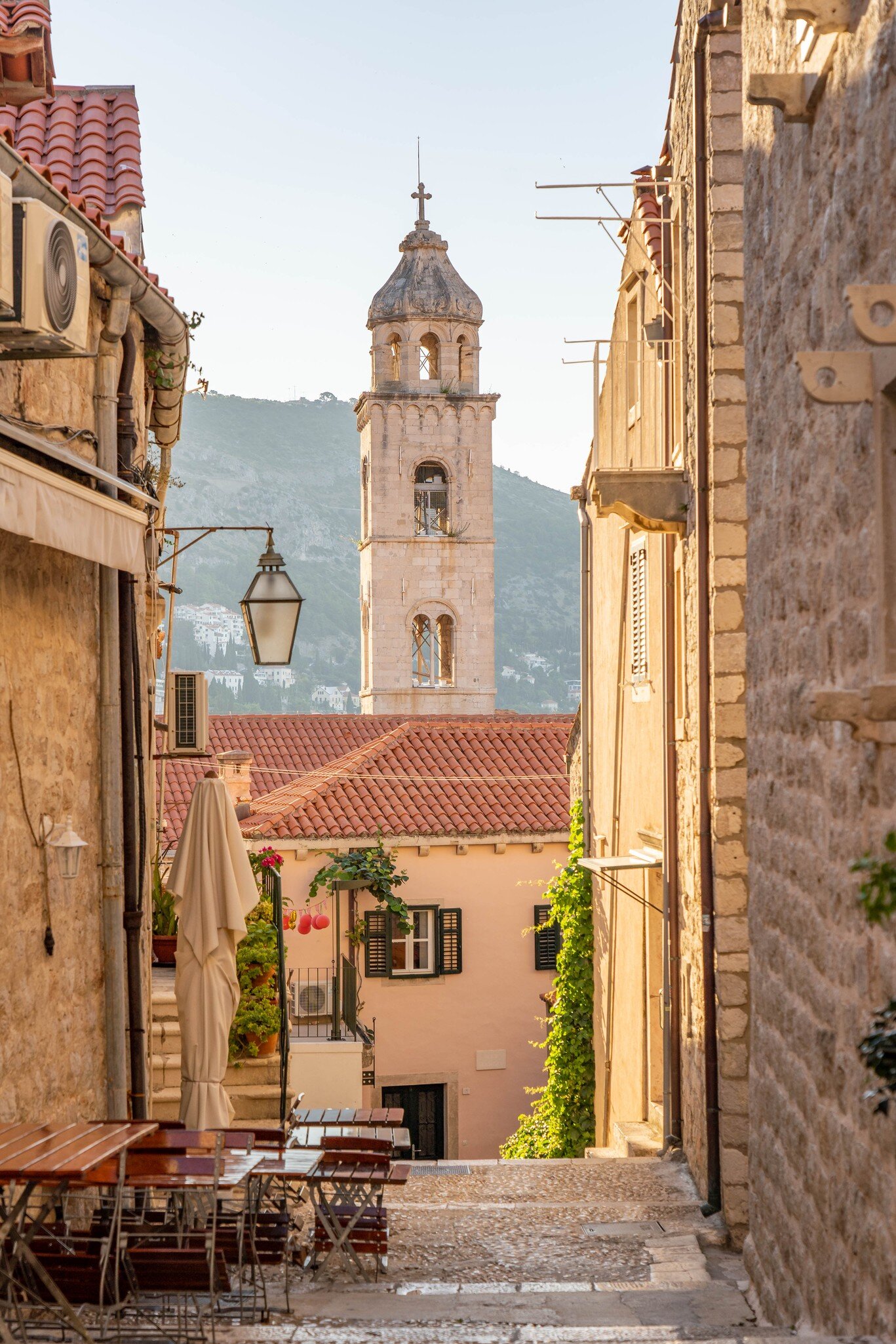 Bell tower of Dominican Monastery view from Dubrovnik old town street in Croatia summer morning, License Type: media, Download Time: 2026-02-23T21:44:42.000Z, User: LP_YKhanna, Editorial: false, purchase_order: 65050 - Digital Destinations and Articles, job: LP, client: App Content, other: Yuvraj Khanna