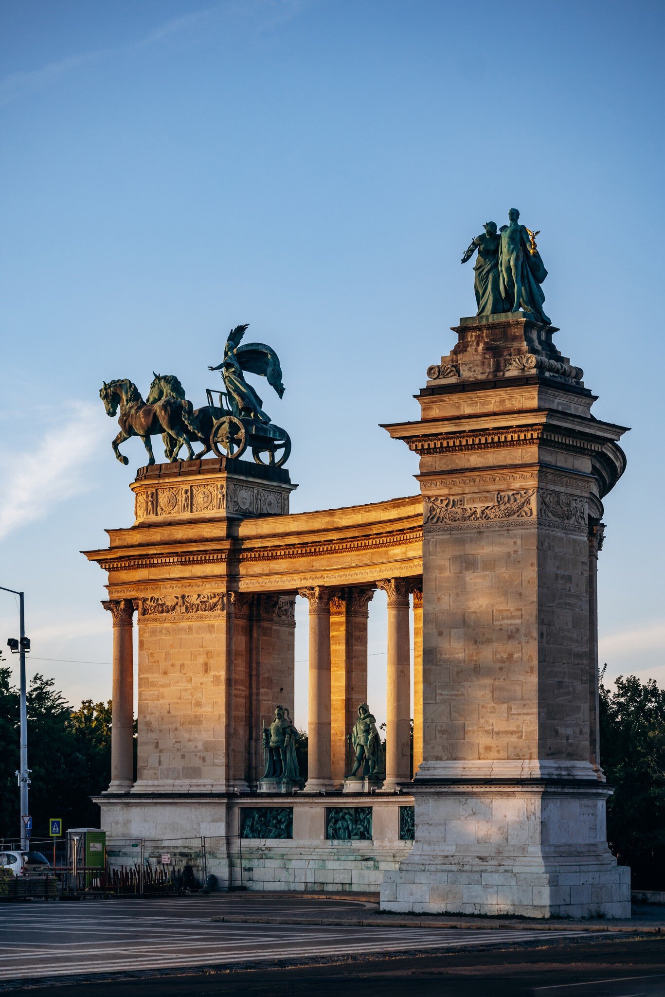 View of Heroes' Square in Budapest, Hungary, at sunset.