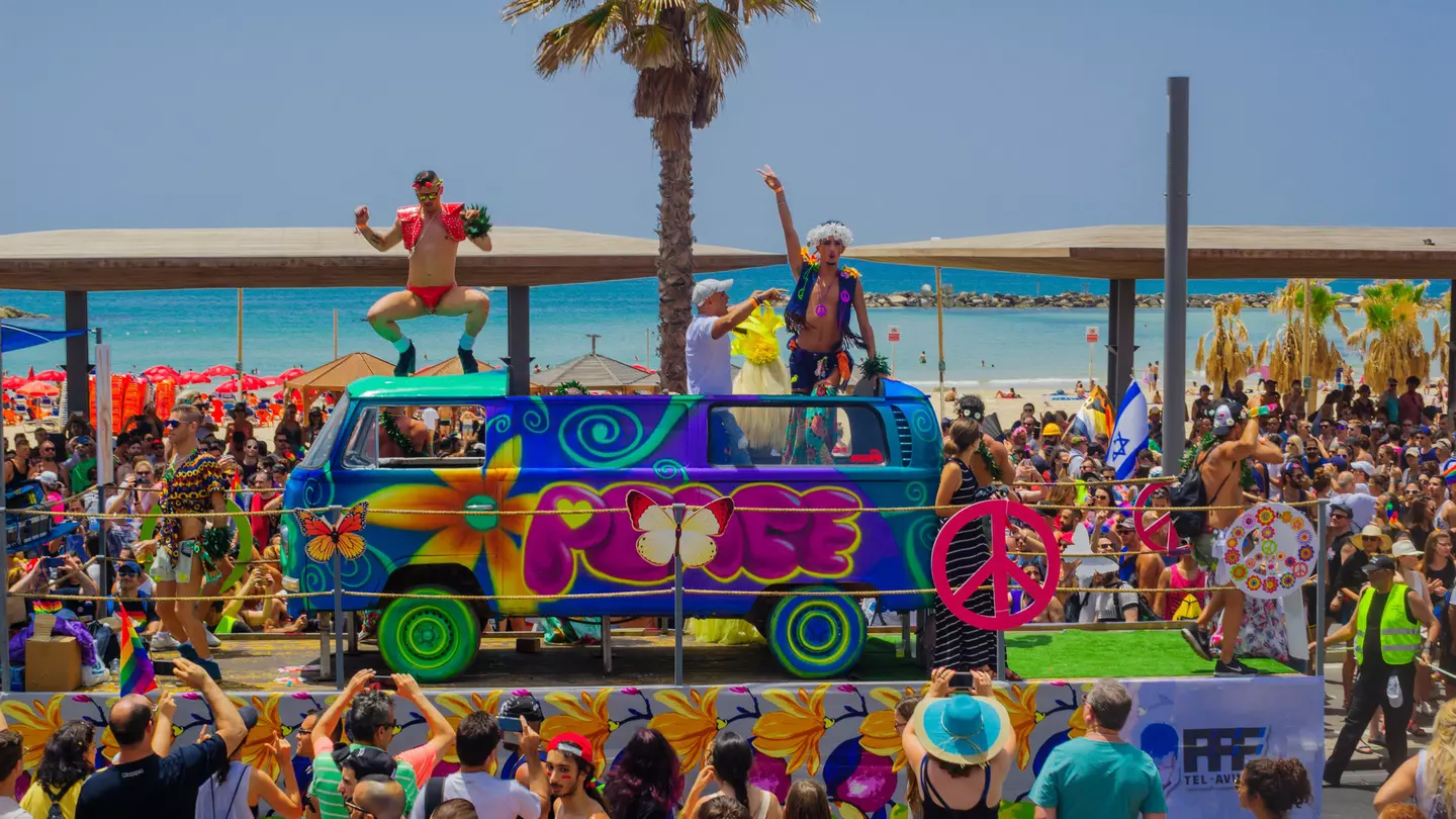 Dancers on a truck entertain the crowd in the Pride parade in the streets of Tel Aviv.