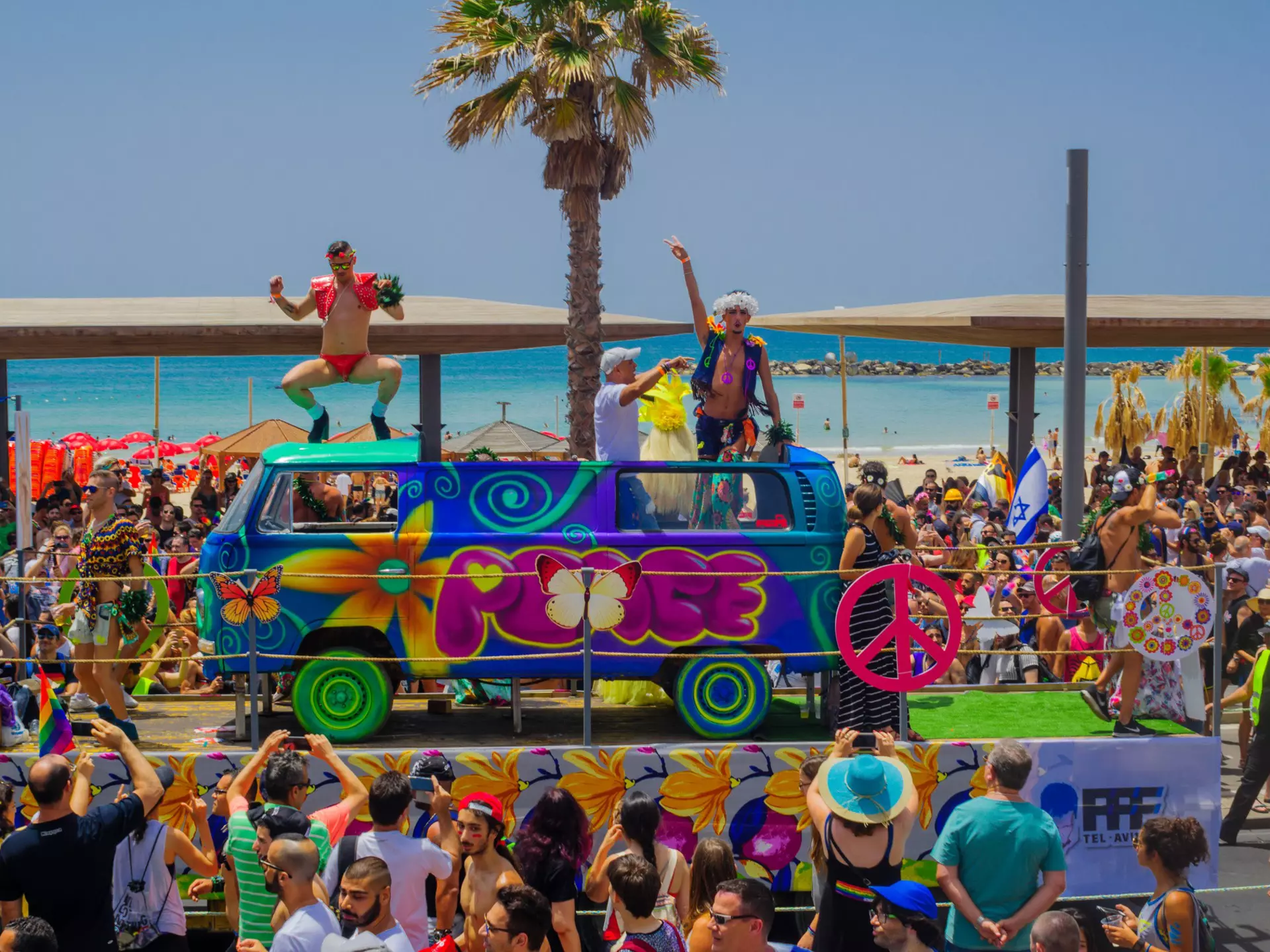 Dancers on a truck entertain the crowd in the Pride parade in the streets of Tel Aviv.