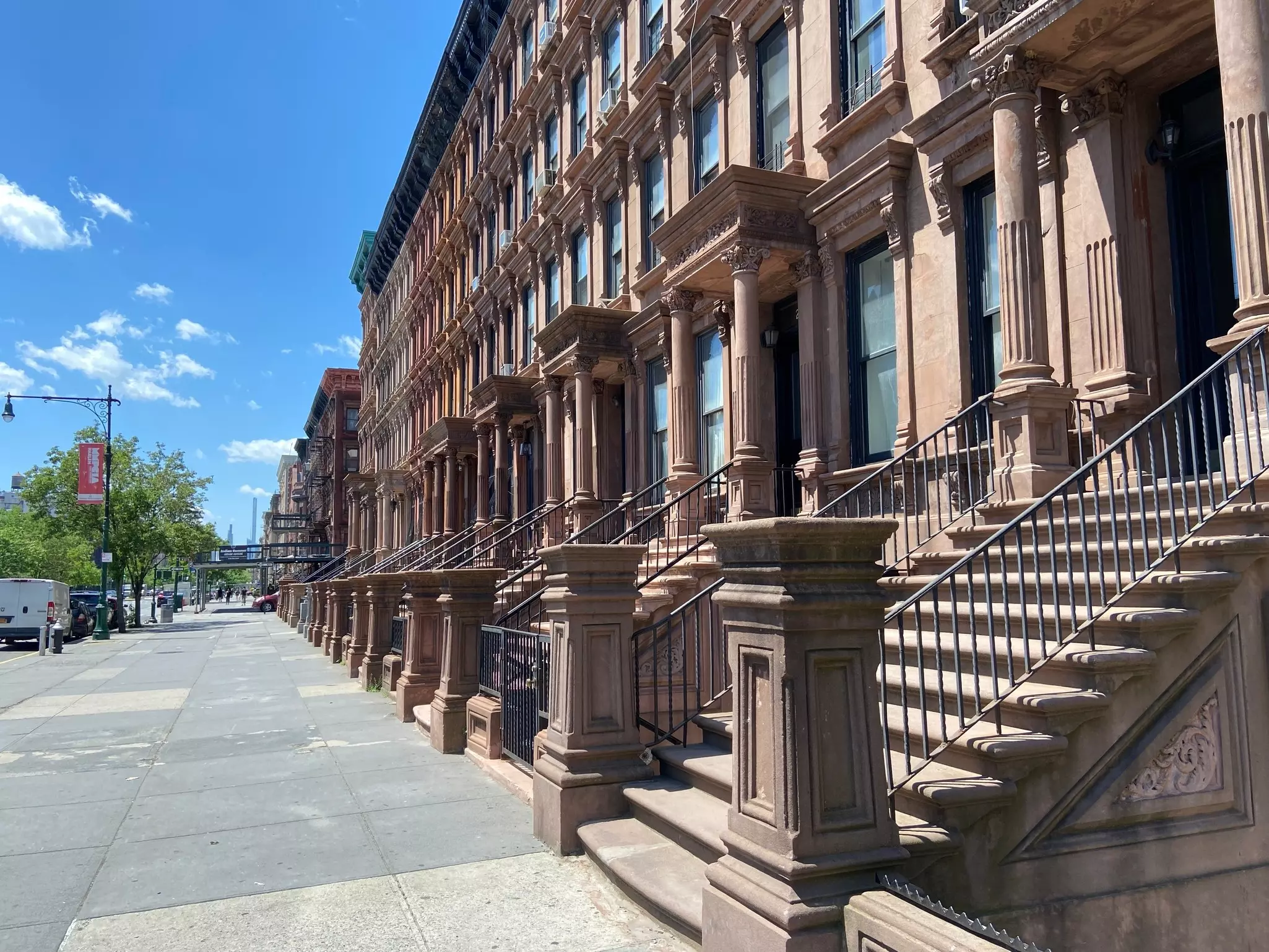 Harlem’s Lenox Ave has one of New York City’s most elegant streetscapes © Here Now / Shutterstock