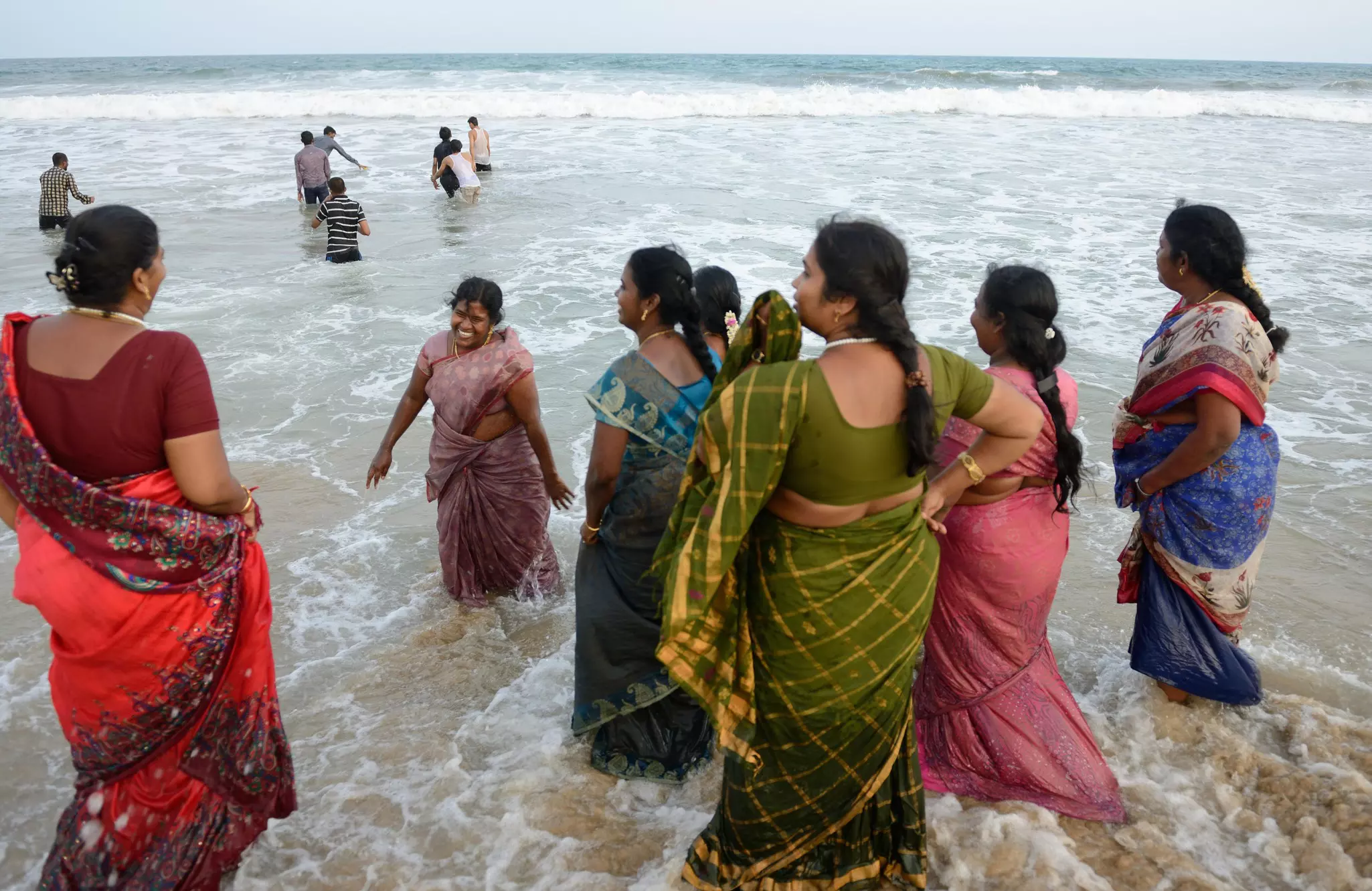 Women in India tend to wear loose-fitting clothes that cover much of their bodies, even at the beach © Frédéric Soltan / Corbis via Getty Images