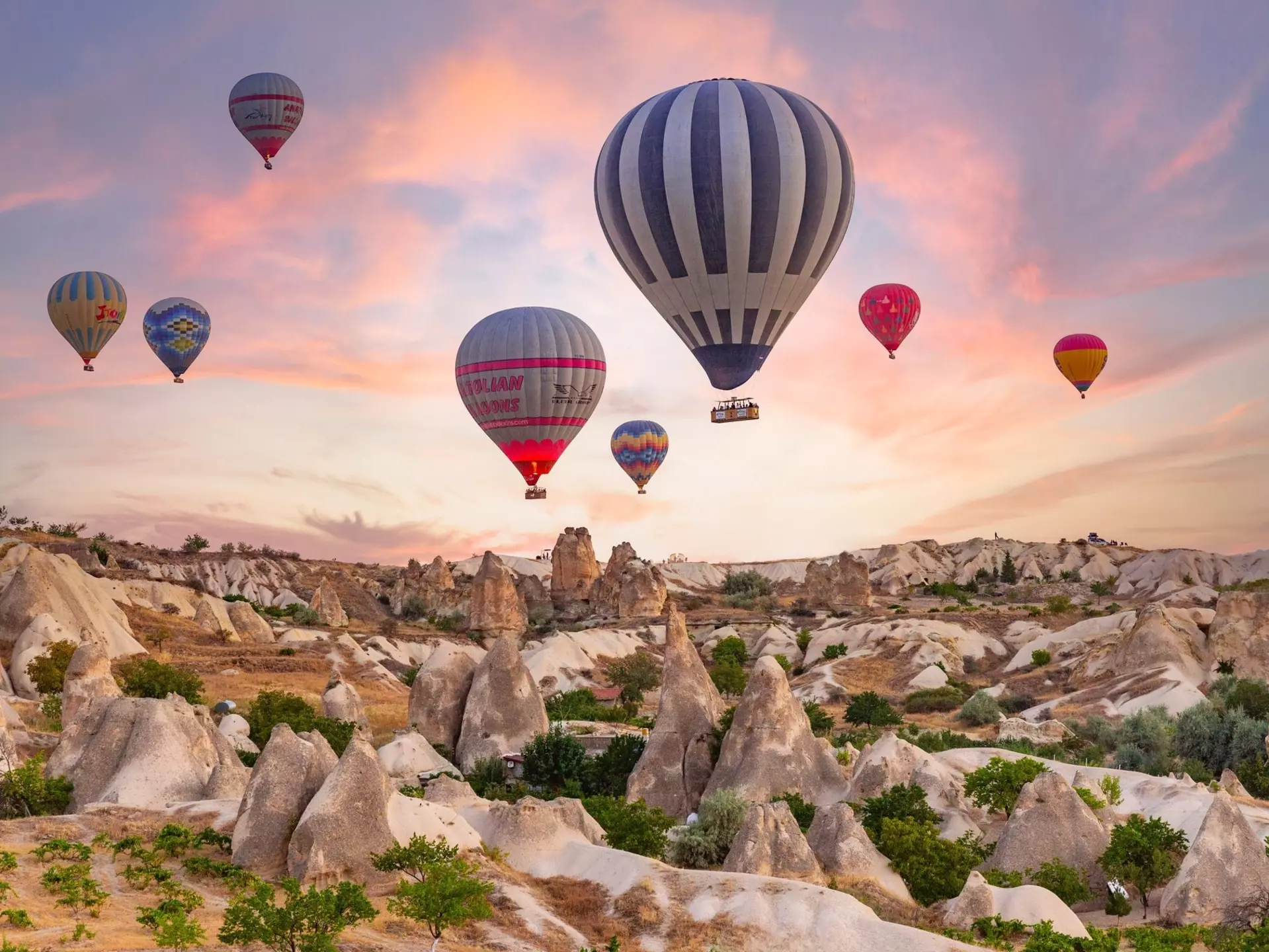Göreme, Turkey - 08 10 2024: Hot air balloon ride over Love Valley, Cappadocia. Breathtaking experience. Alien Anatolian landscapes., License Type: media, Download Time: 2025-12-09T22:31:57.000Z, User: Norma.PrauseBrewer_LonelyPlanet, Editorial: true, purchase_order: 56530 - Guidebooks, job: Global Publishing WIP, client: Europe 5, other: Norma Brewer