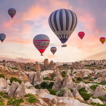 Göreme, Turkey - 08 10 2024: Hot air balloon ride over Love Valley, Cappadocia. Breathtaking experience. Alien Anatolian landscapes., License Type: media, Download Time: 2025-12-09T22:31:57.000Z, User: Norma.PrauseBrewer_LonelyPlanet, Editorial: true, purchase_order: 56530 - Guidebooks, job: Global Publishing WIP, client: Europe 5, other: Norma Brewer