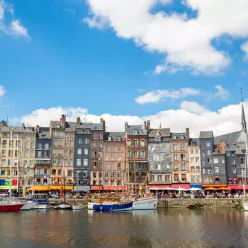 Honfleur downtown in Normandy France
526919853
Travel, Normandy, People Traveling, Tourism, Building Exterior, Cloudscape, Le Havre, Sail, Medieval, History, Journey, Exploration, Ancient, French Culture, Famous Place, Construction Industry, Architecture, Nature, Urban Scene, Outdoors, Honfleur, France, Europe, Summer, Bay Of Water, Cloud - Sky, Sea, River, Water, House, Church, Built Structure, Commercial Dock, Harbor, Cityscape, City, Village, Town, Nautical Vessel
CLEARED FOR DIGITAL USE ONLY -