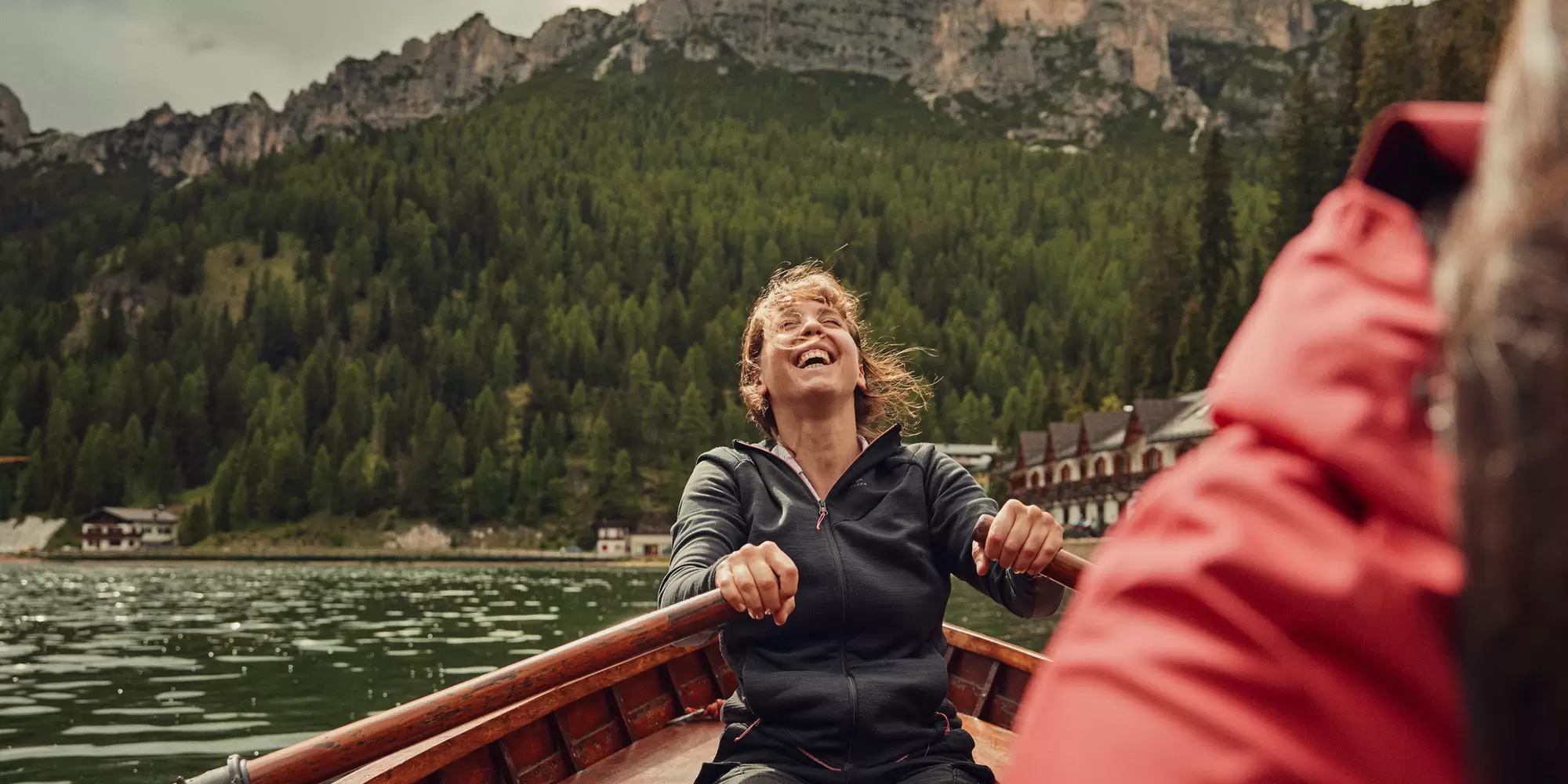 friends enjoying a canoe ride on a mountain lake near auronzo, surrounded by the dolomites, tre cime di lavaredo in the dolomites, italy, chiara bonetti, lonely planet, Auronzo, Veneto, Italy, june 2026, travel